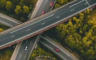 Four roads with cars on it